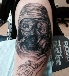 Soldier with gas mask tattoo