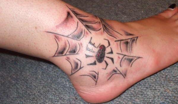 Spider web ankle tattoo