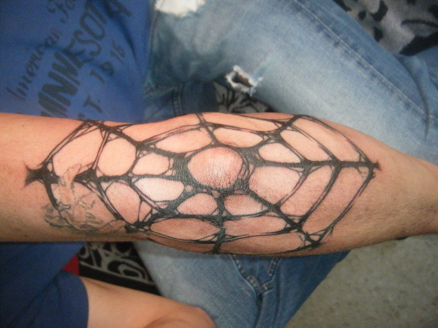 Spider web elbow tattoo