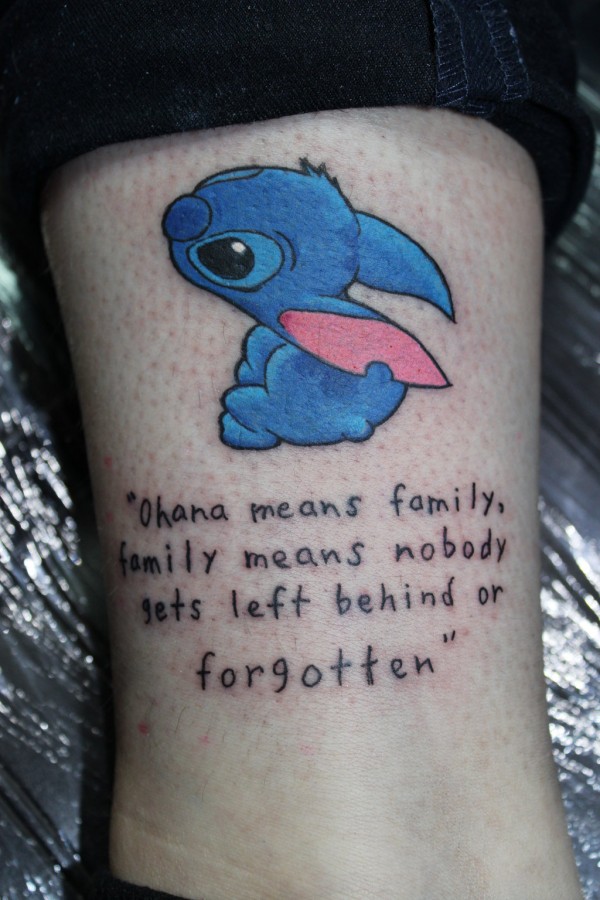 Stitch and quote leg tattoo