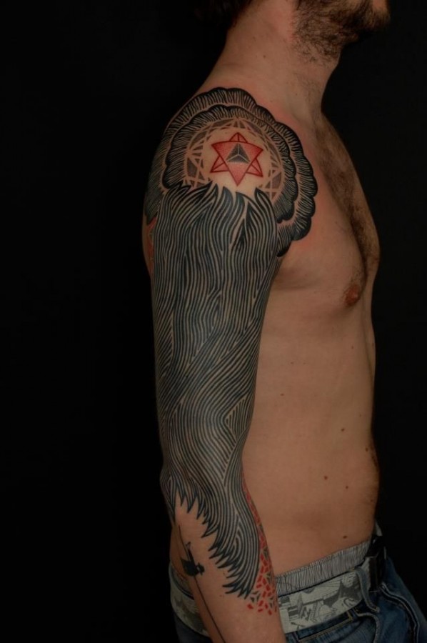 Stunning full arm tattoo by Gerhard Wiesbeck