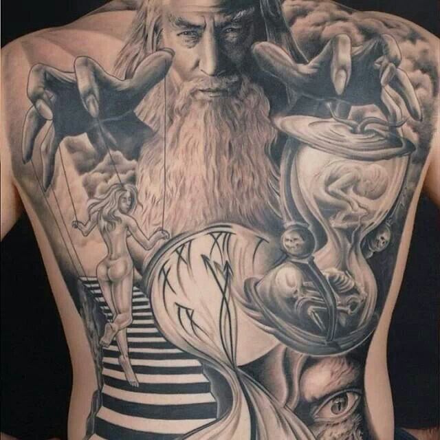 Stunning puppet master back tattoo