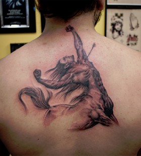 Stunning sagittarius back tattoo