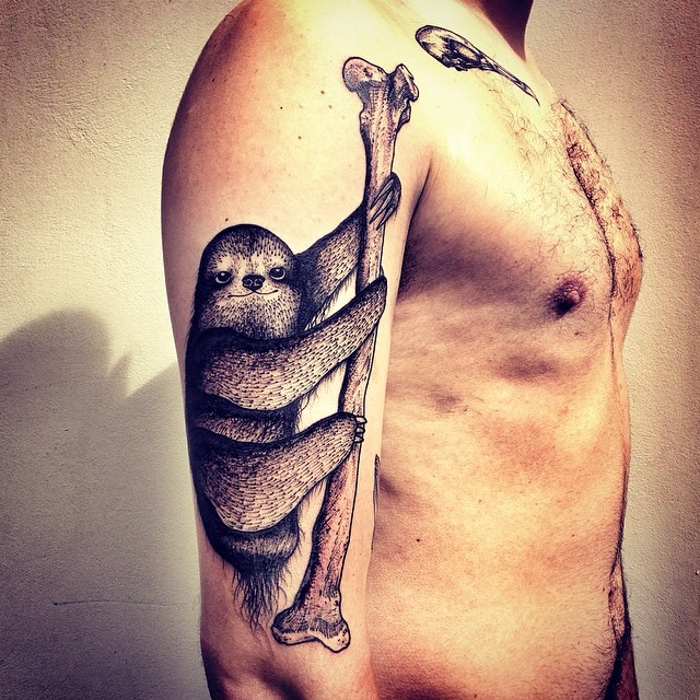 Stunning sloth arm tattoo