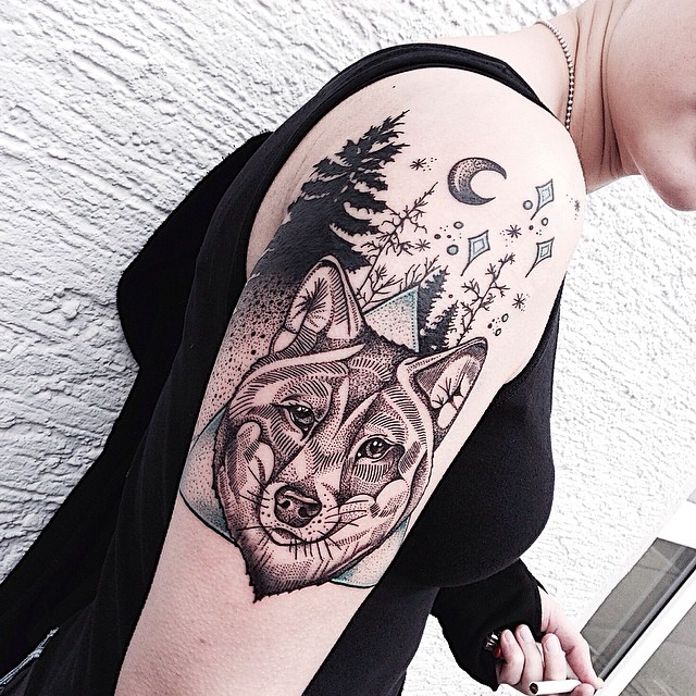 Stunning wolf arm tattoo