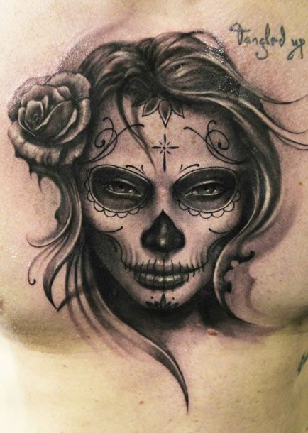 Sugar skull tattoo by Riccardo Cassese