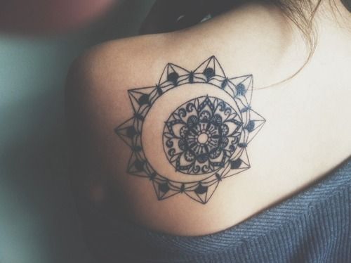 Sun and star mandala tattoo