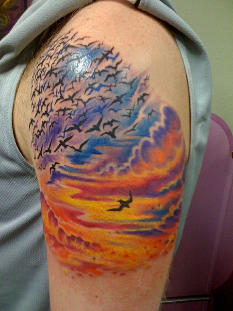 Sunset and birds tattoo