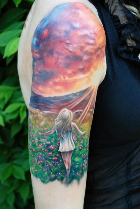 Sunset and girl tattoo by Kyle Cotterman