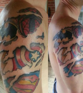 Superhero logos arm tattoo