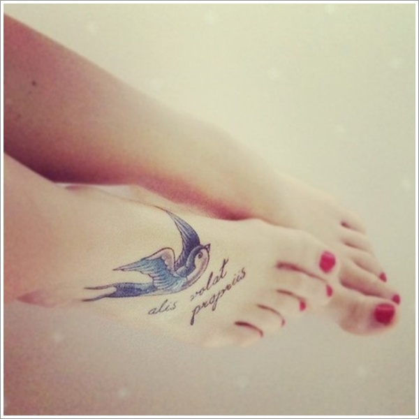 Swallow and quote foot tattoo