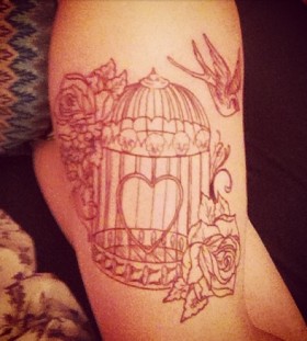 Sweet birdcage leg tattoo