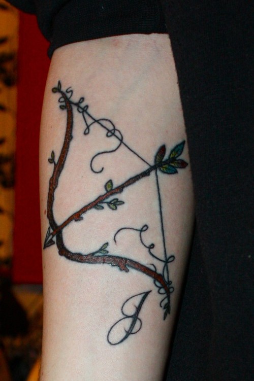 Sweet bow and arrow tattoo