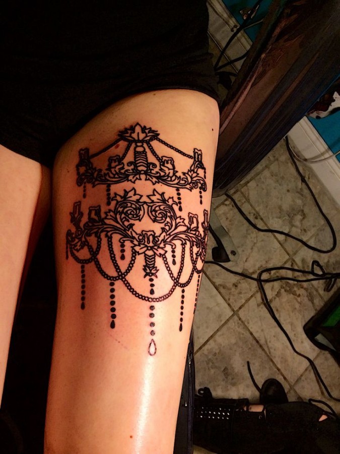 Sweet chandelier leg tattoo