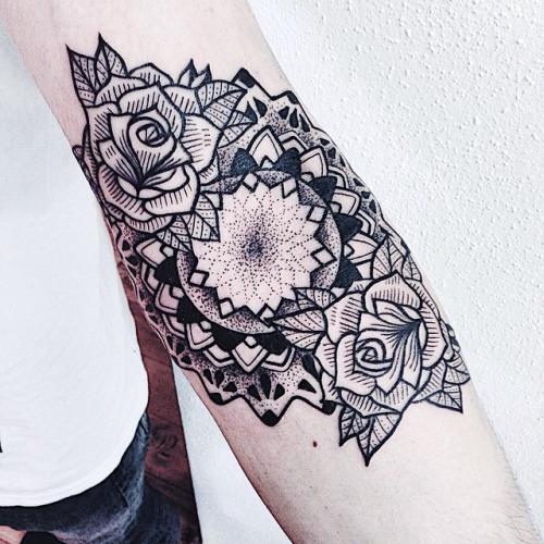 Sweet flowers arm tattoo