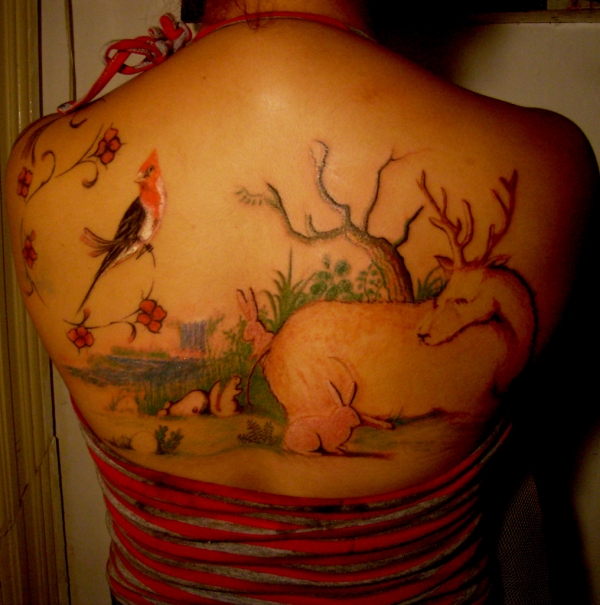 Sweet jungle back tattoo