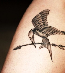 Sweet mockingjay leg tattoo