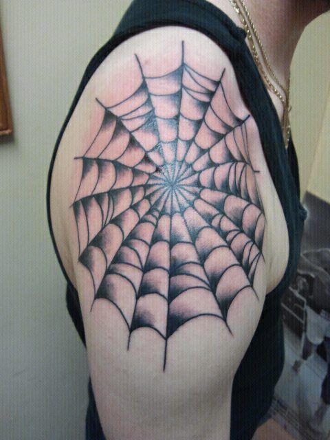 Sweet spider web tattoo