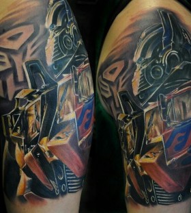 Sweet transformers arm tattoo