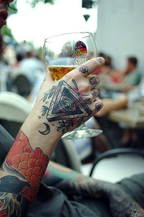 Sweet triangle eye hand tattoo