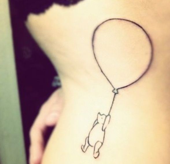 Sweet winnie with balloon tattoo