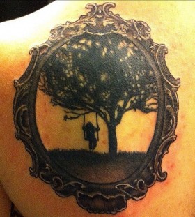 Swing on a tree frame tattoo