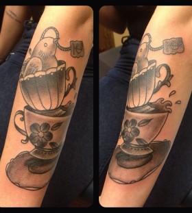 Teacups and bird tattoo