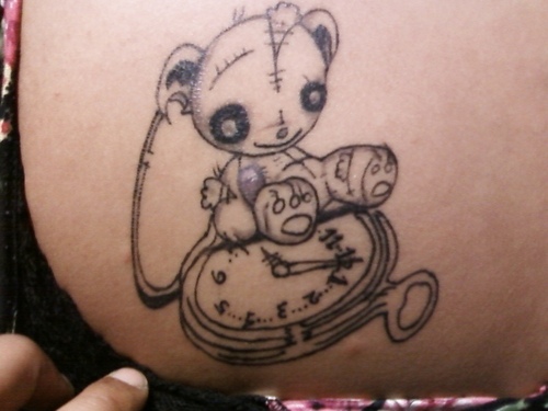 Teddy and pocket watch tattoo