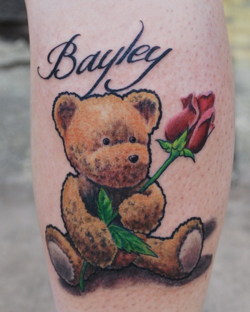 Teddy bear with rose tattoo