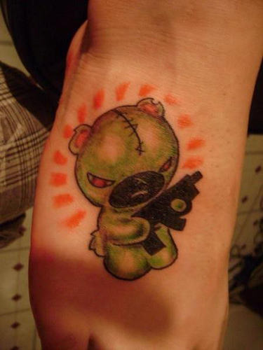 Teddy with a gun tattoo