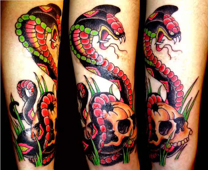 Terrifying cobra arm tattoo