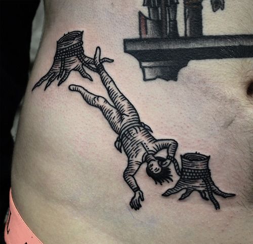 Tied up man tattoo by Philip Yarnell