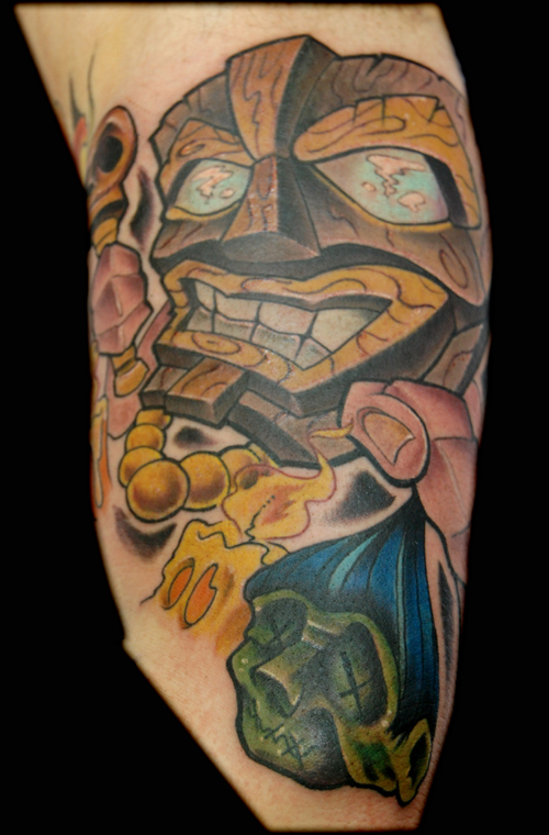 Tiki mask tattoo