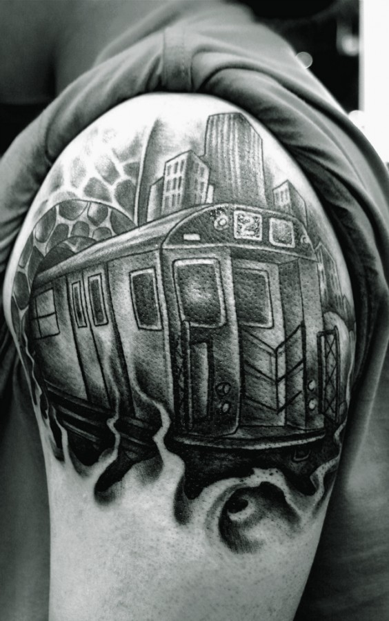 Train and buildings tattoo