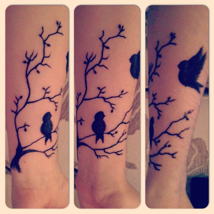 Tree branch and birds tattoo