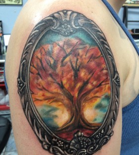 Tree frame arm tattoo