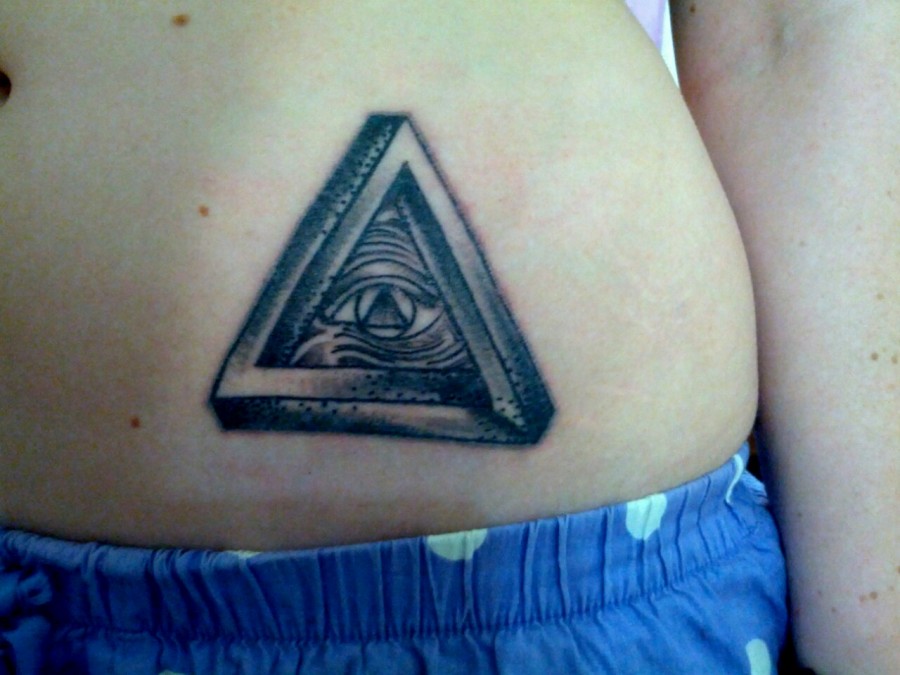 Triangle eye stomach tattoo