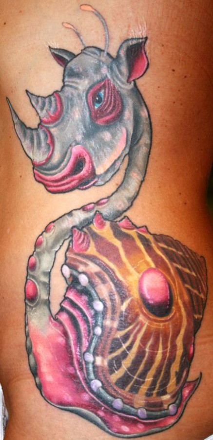 Trippy rhino snail tattoo