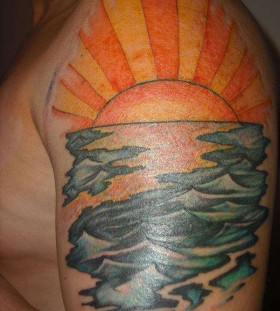 Water and sunset tattoo
