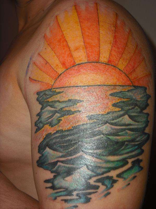 Water and sunset tattoo