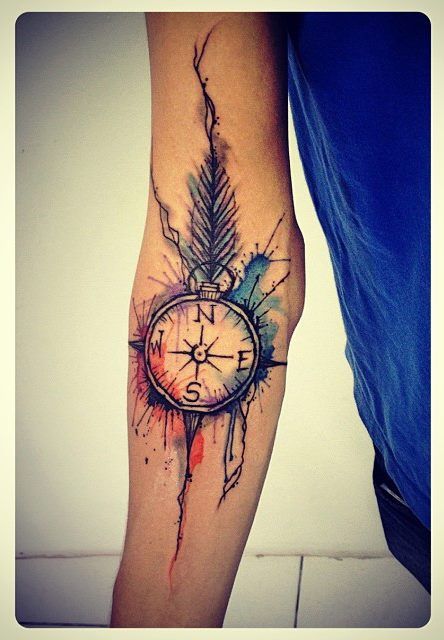 Watercolour compass arm tattoo by Tyago Compiani