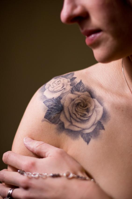 White rose collarbone tattoo