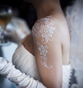 White shoulder bride tattoo