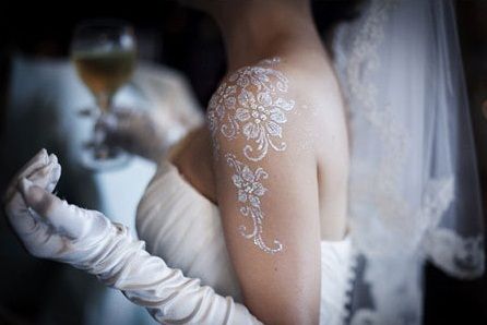 White shoulder bride tattoo