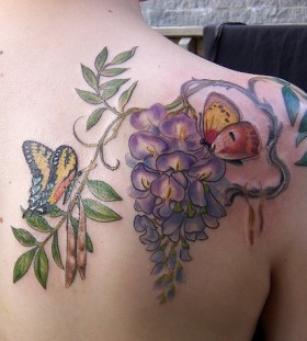 Wisteria and butterflies tattoo by Esther Garcia
