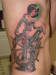 Woman and wheel side tattoo