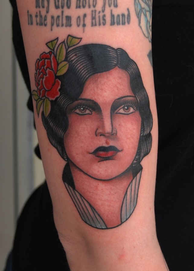 Woman’s portrait tattoo