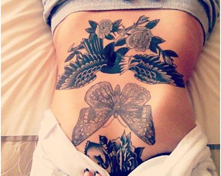 Wonderful butterfly stomach tattoo