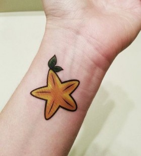 Wrist yellow fruit tattoo