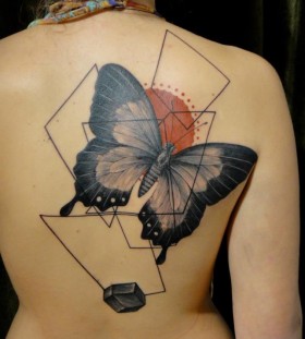 Xoil butterfly back tattoo